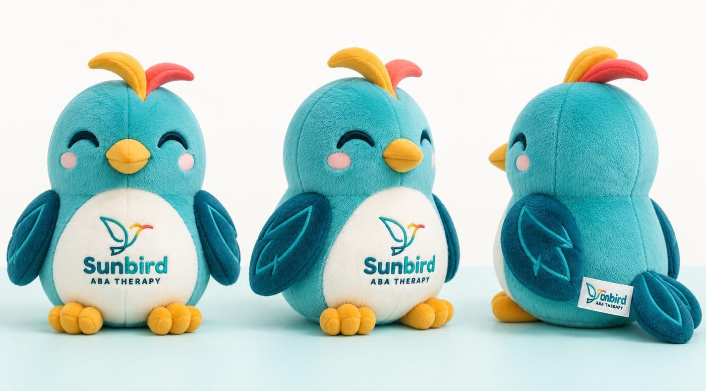 Sunbird's plush mascots — smiling teal birds with sunny head crests and the Sunbird logo on their bellies
